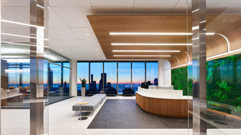 headlands-technologies-headquarters-relocation_reception-living-wall-boardroom-night